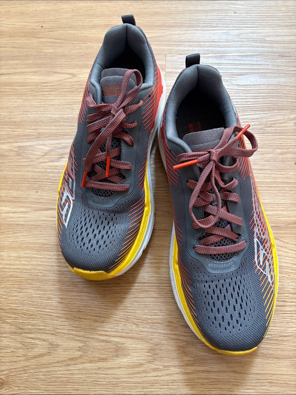 Skechers Women's Gray Athletic Shoes with Yellow and Red Accents